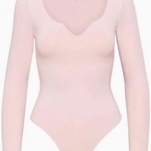 Aritzia Babaton Long-Sleeve V-Neck Bodysuit in Light Pink